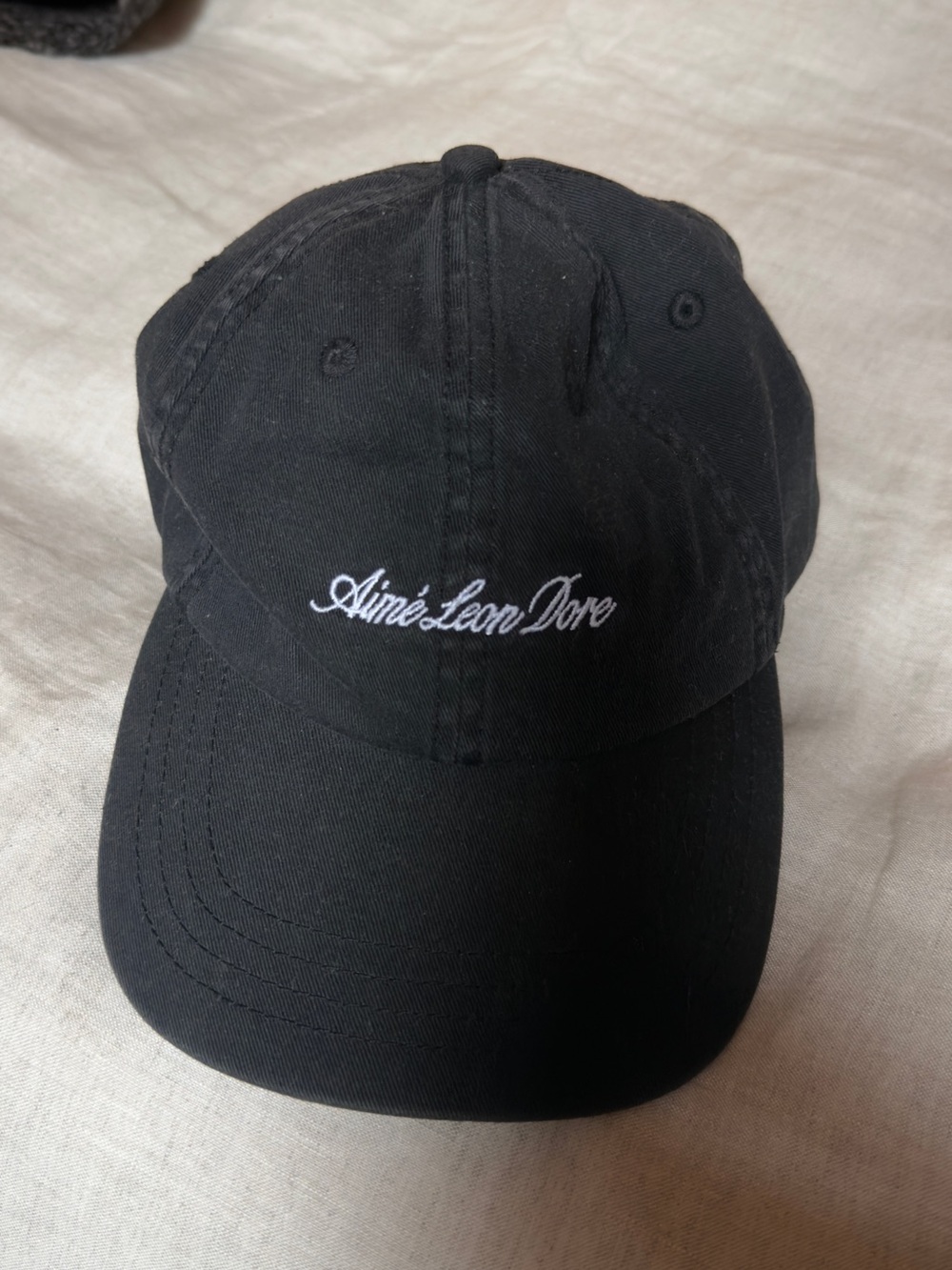 Aime Leon Dore Black Baseball Cap with White Script Logo